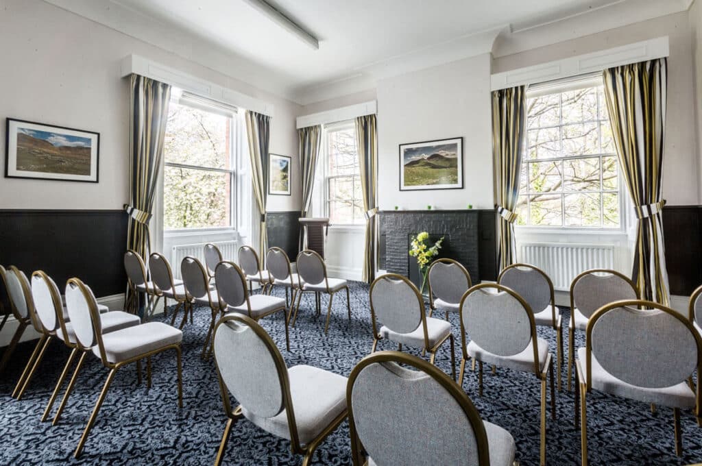 Private service chapel at JW Binks Funeral Directors, set out with rows of chairs
