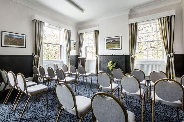 Private service chapel at JW Binks Funeral Directors, set out with rows of chairs